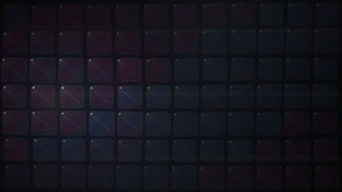 A close-up studio shot of a modern MIDI controller pad grid featuring dark .. Stock Footage 346723332