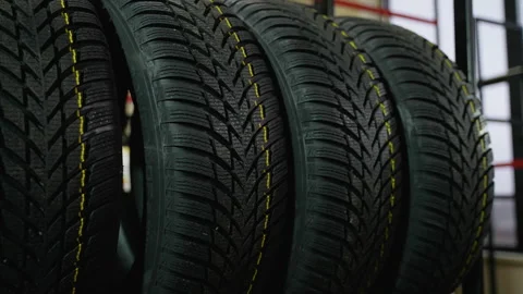 Close-up of studless winter tires with deep tread pattern Video stock 301559731