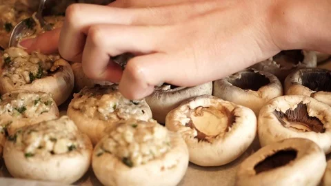 Close up of stuffing mushroom caps with minced meat Video stock 88090877