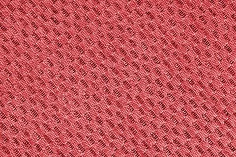 Close up sturcture, texture of red jacquard fabric with diagonal rough weav.. Stock Photos