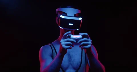 Close up stylish future handsome man gamer wearing virtual reality headset on Stock Footage 156896210