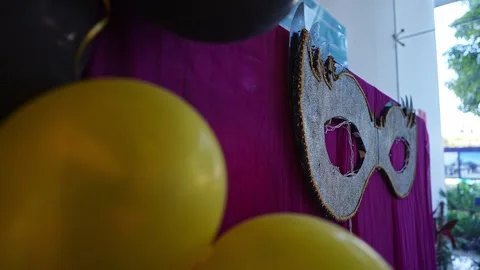 Close-up of a stylish silver mask decoration for a festive and joyful party.. Video stock 331788560