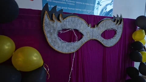 Close-up of a stylish silver mask decoration for a festive and joyful party.. Video stock 331788604