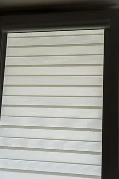 Close-up of stylish window blinds with horizontal stripes, perfect for modern Stock Photos