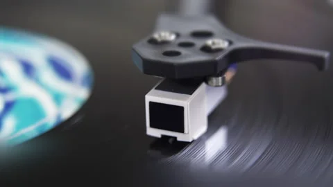 Close up of stylus or needle on turntable with vinyl record spinning Stock Footage 140583751