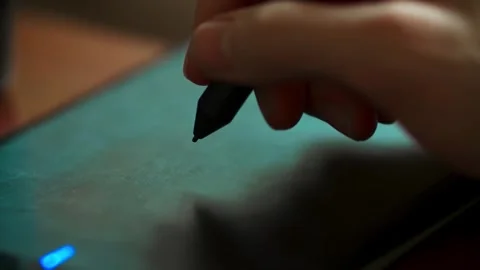 A close-up of the stylus pen for a graphics tablet. Rustic Charm Meets Digital Stock Footage 264063237
