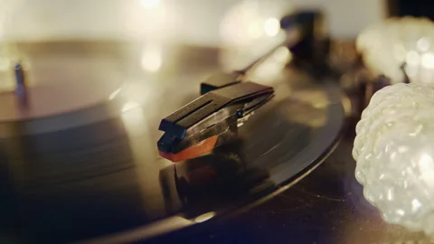 Close Up of Stylus Playing a Vinyl Record on Turntable Stock Footage 345398684