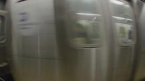 Close-up of a subway train passing Stock Footage 271720761