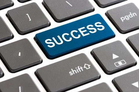 Close up success button on keyboard computer Stock Photos