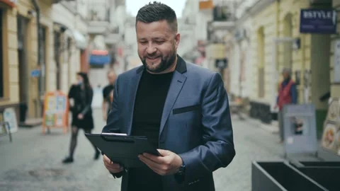 Close up successful man standing outside near business building. Stock Footage 172503071