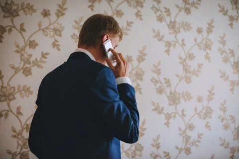 Close-up of a successful man talking on cell phone Stock Photos