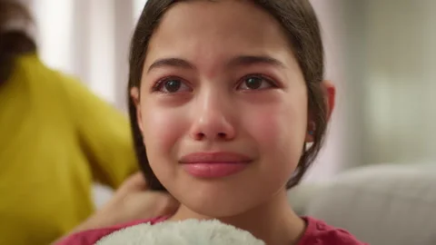 Close up suffering sad crying bad feeling Caucasian little girl kid daughter Stock Footage 283769130