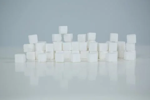 Close up of sugar cubes stacked Stock Photos