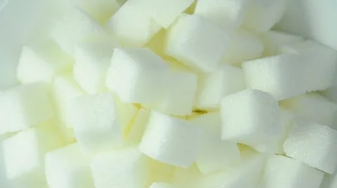 Close up of sugar cubes on white background Video stock 12303742