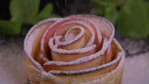 Close Up of Sugar Sprinkles falling on Fresh Apple Rose Pie 4K Stock-Footage 130765692