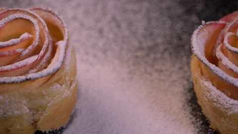 Close Up of Sugar Sprinkles falling on Fresh Apple Rose Pie Dessert 스톡 동영상 130766320