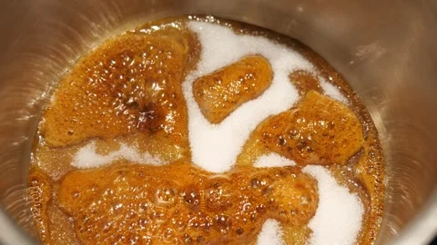 Close up of sugar turning into caramel Stock-Footage 249617594