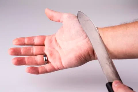 Close up of a suicidal man hand Stock Photos