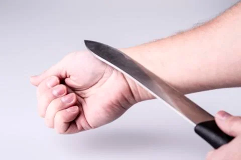 Close up of a suicidal man hand Stock Photos