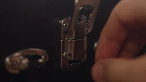 Close-up of a suitcase or case lock. Video stock 281860910