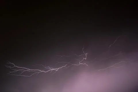 Close up summer lightning thunder bolt on the dark sky Stock Photos