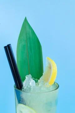 Close-up summer refreshing drink lemonade with ice frappe, lemon Stock Photos