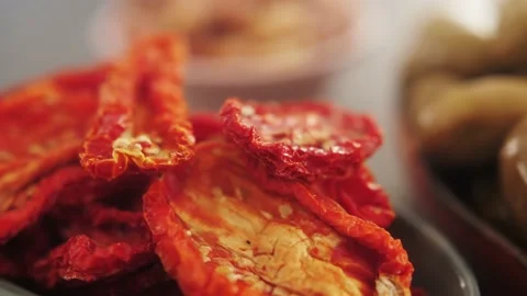 Close up of sun dried red tomato halves in the bowl. Video stock 196291829