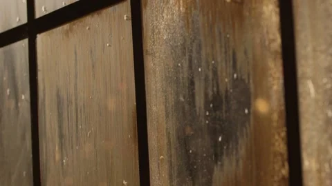 Close up of sun lit winter windows with bokeh Video stock 136336291