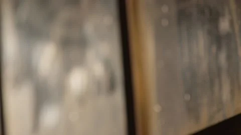 Close up of sun lit winter windows with bokeh Video stock 136336296