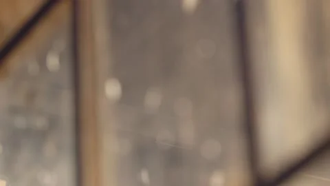 Close up of sun lit winter windows with bokeh Video stock 136336400