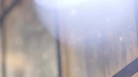 Close up of sun lit winter windows with bokeh Stock-Footage 136336413