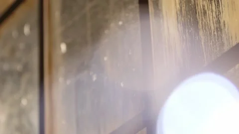 Close up of sun lit winter windows with bokeh Stock Footage 136340198