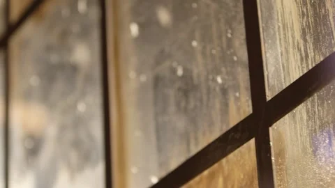 Close up of sun lit winter windows with bokeh Stock Footage 136340199