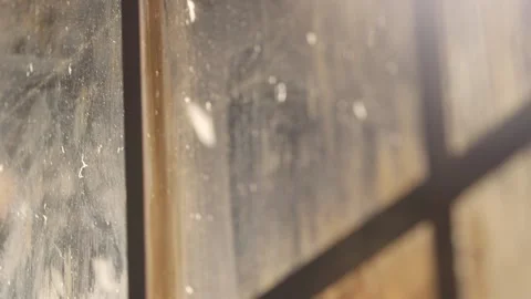 Close up of sun lit winter windows with bokeh Stock Footage 136340205