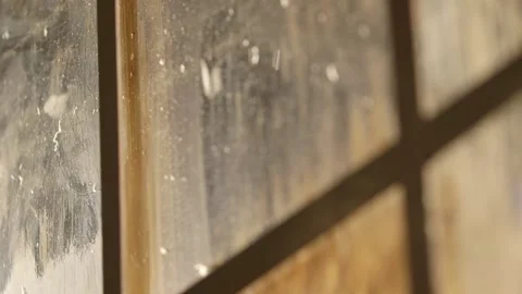 Close up of sun lit winter windows with bokeh Stock Footage 136340212