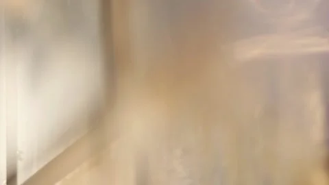 Close up of sun lit winter windows with bokeh Stock Footage 136340214