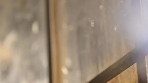 Close up of sun lit winter windows with bokeh Stock Footage 136340219