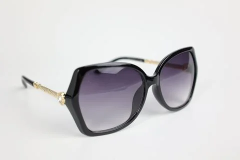 Close-up of sunglasses on white background Stock Photos