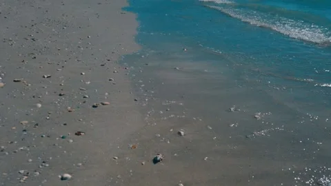 Close Up Sunny Beach Waves Blue Sky with Wave Action of Water on sand shore line Stock Footage 236804800