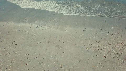 Close Up Sunny Beach Waves Blue Sky with Wave Action of Water on sand shore line Stock Footage 236805184