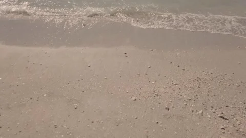 Close Up Sunny Beach Waves with Wave Action of Water on sand shore line Stock Footage 236805179