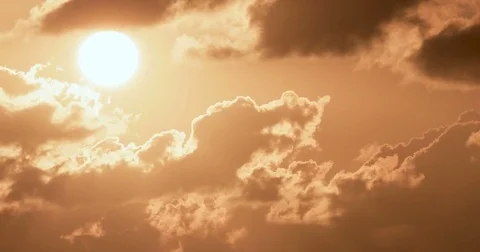 Close up of a sunset behind clouds Stock Footage 80808730