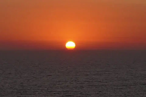 Close up sunset.  Sunset over ocean. 2K Stock Footage 193940564