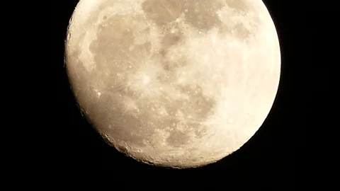 Close-up of a Super Moon with Mystical Clouds Moving Past. 스톡 동영상 82708127