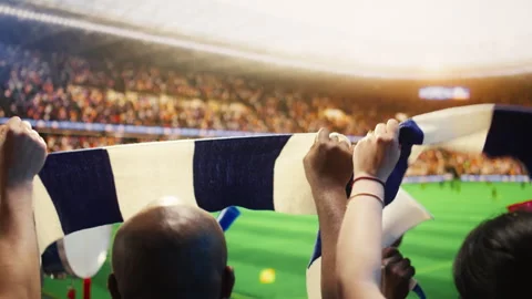 Close up of supporters lifting scarves during match day Video stock 337555356