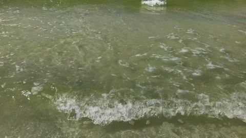 Close up of surf moving towards camera Stock Footage 94819023