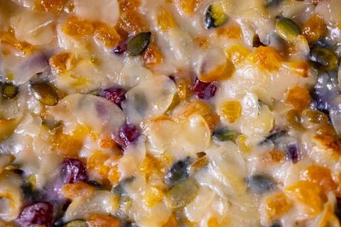 A close-up of the surface of a cake covered in glossy frosting. Stock Photos