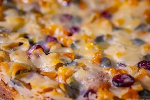 A close-up of the surface of a cake covered in glossy frosting. Stock Photos
