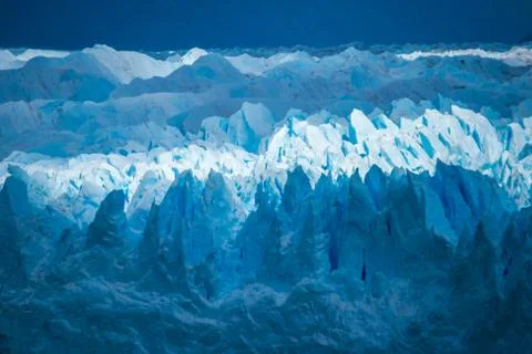 A close-up of the surface of the glacier. Shevelev. Stock Photos