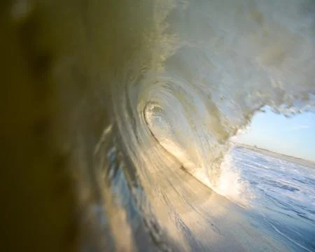 Close up surface level view of rolling wave and beach, Laguna Beach, California, Stock Photos